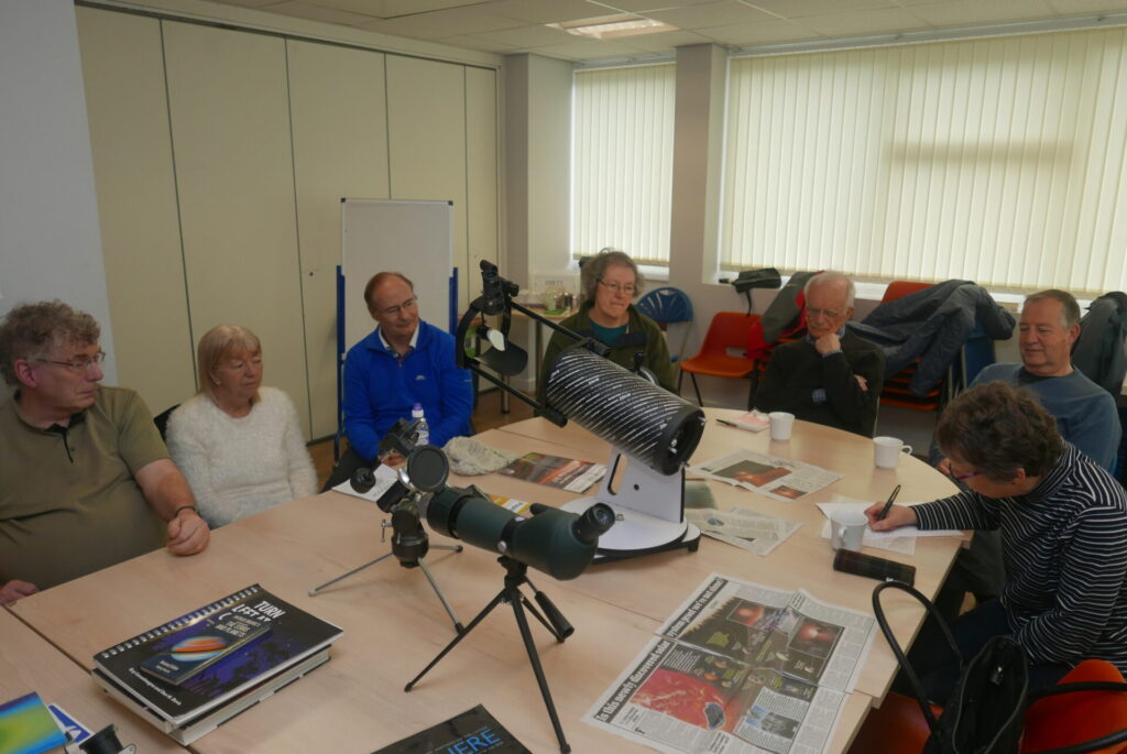 Science Group discussing practical aspects of Astronomy